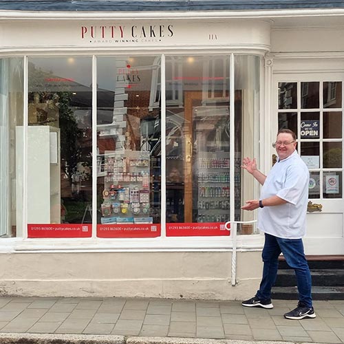 Putty Cakes shop exterior with Gavin alongside